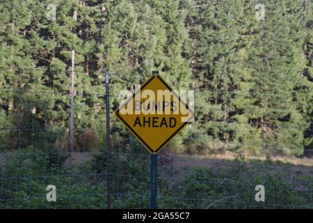 A 'bumps ahead' sign in the countryside Stock Photo