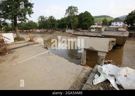 Bad Neuenahr Ahrweiler, Germany. 22nd July, 2021. A destroyed bridge can be seen above the river Ahr. Numerous bridges were destroyed in the area. Credit: Bodo Marks/dpa/Bodo Marks/dpa/Alamy Live News Stock Photo