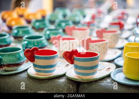 handmade ceramic coffee cups with love Stock Photo
