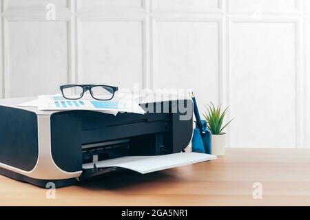 Copier or printer in a modern office interior close up Stock Photo