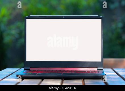 Laptop with blank screen on the Table Stock Photo