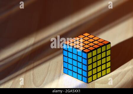 Colorful cube on wood background Stock Photo