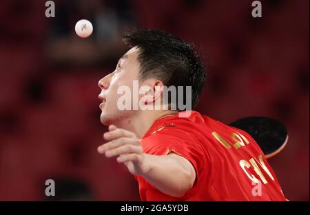 Tokio, Japan. 29th July, 2021. Table Tennis: Olympics, Preliminary Match, Singles, Men, Semifinals, Ovtcharov (Germany) - Long (China) at Tokyo Metropolitan Gymnasium. Ma Long serves. Credit: Friso Gentsch/dpa/Alamy Live News Stock Photo