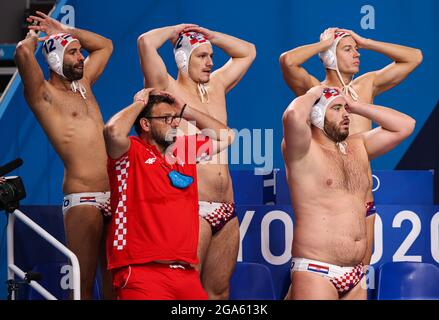 Tokyo, Japan. 29th July, 2021. Members of team Croatia react during the men's preliminary round match of Water Polo between Croatia and Montenegro at the Tokyo 2020 Olympic Games in Tokyo, Japan, on July 29, 2021. Credit: Wang Jingqiang/Xinhua/Alamy Live News Stock Photo