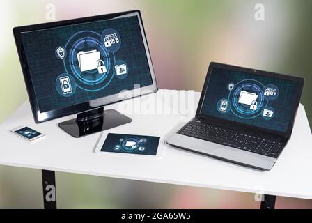 Confidential data concept shown on different information technology devices Stock Photo