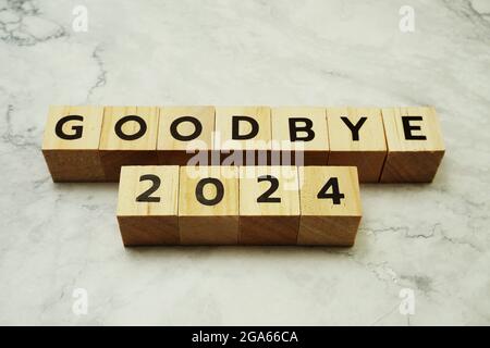 Goodbye 2024 alphabet letters on marble background Stock Photo