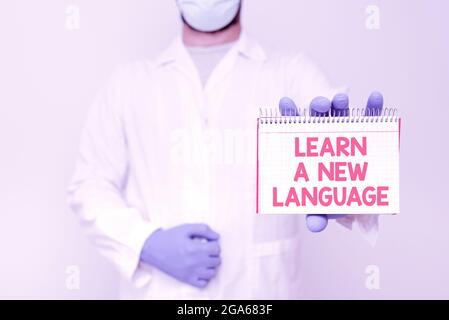 Sign displaying Learn A New Language. Business showcase ability to communicate in the second orforeign language Scientist Presenting New Research Stock Photo