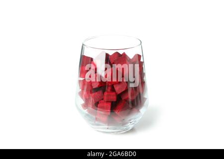 Glass with beetroot cubes isolated on white background Stock Photo