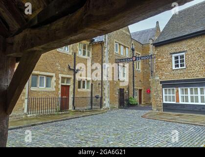 A view from under the Butter Cross towards the entrance to Oakham School, Oakham, the county town of Rutland, England, UK Stock Photo