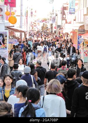 Japan. 23rd Oct, 2017. Large crowd is visible on Takeshita Street, a major shopping district in Harajuku, Shibuya Ward, Tokyo, Japan, October 23, 2017. (Photo by Smith Collection/Gado/Sipa USA) Credit: Sipa USA/Alamy Live News Stock Photo