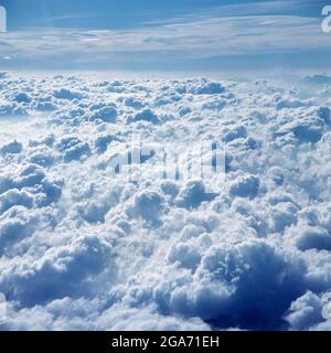 View of billowing clouds from above. Stock Photo