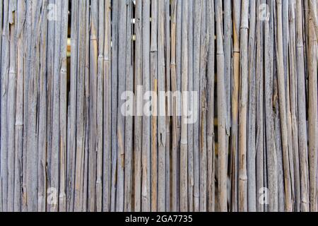 Bamboo brown straw mat as abstract texture background composition, top view above Stock Photo