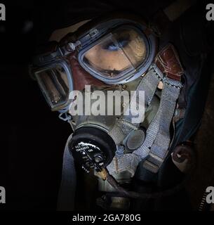 Close up of British world war two flying helmet, goggles and oxygen mask. Stock Photo