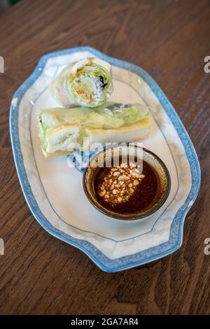 Side view of fresh Vietnamese spring rolls, Vietnamese cold, with dipping sauce with peanuts Stock Photo