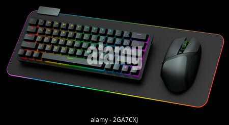 Computer keyboard and mouse on professional pad isolated on black background. Stock Photo