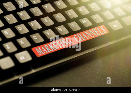 Text sign showing Marketing Channels. Word for the necessary to transfer the ownership of goods Typing Online Member Name Lists, Creating New Stock Photo