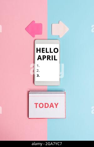 Conceptual caption Hello April. Business concept a greeting expression used when welcoming the month of April Technological Difference And Choices Stock Photo