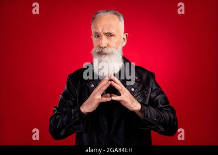 Photo of senior handsome man serious confident think thoughtful brainstorming deep isolated over red color background Stock Photo