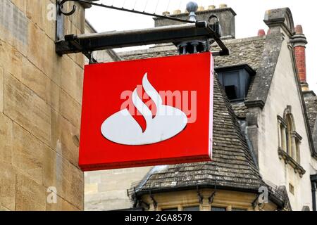 Oxford, England - June 2021: Sign above the entrance to a branch of the Santander Bank and building society. Stock Photo