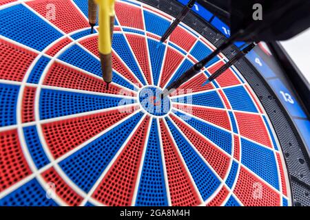 electronic darts wall board and darts on it Stock Photo
