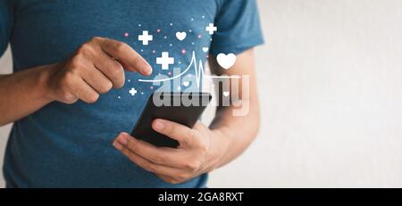 Close up hands holding smartphone. fat man using cellphone for health care and lose weight.health care concept Stock Photo