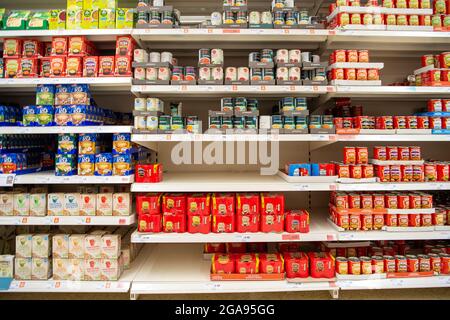 Taplow, Buckinghamshire, UK. 29th July, 2021. Some customers have been panic buying tinned food leaving some gaps in the shelves, however, Sainsbury's Supermarket in Taplow was well stocked this morning. There are some supply chain issues in general with supermarkets due to HGV lorry driver shortages as well as supply chain production staff having to self isolate due to having been pinged by the Covid-19 NHS Track and Trace app19 Stock Photo