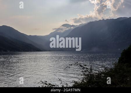 Perast, Montenegro - July 20, 2021 Foggy and cloudy evening in the Bay of Kotor Stock Photo