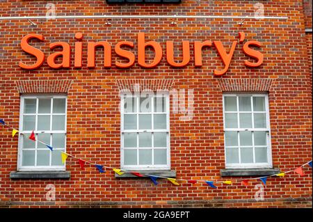 Chesham, Buckinghamshire, UK. 28th July, 2021. The Sainsbury's supermarket in Chesham. Some supermarkets are reporting issues with their supply chain due to a shortage of HGV drivers. Credit: Maureen McLean/Alamy Stock Photo