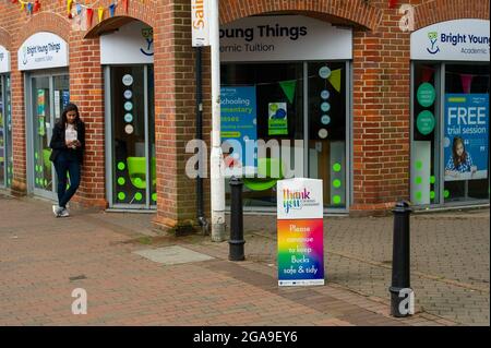 Chesham, Buckinghamshire, UK. 28th July, 2021. Shoppers in Chesham High Street today on market day. Credit: Maureen McLean/Alamy Stock Photo