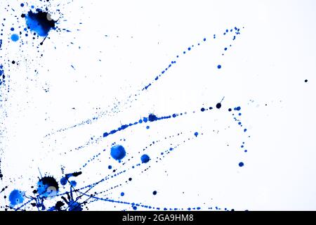 Top view of blue watercolor splashes on a blank paper Stock Photo
