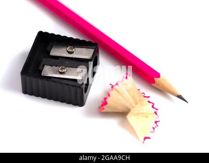 A Freshly Sharpened Pencil and Sharpener Isoalted on a White Background Stock Photo