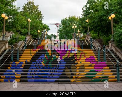 Ottawa, Ontario, Canada. July 2021. Colorful stairs right in the middle of Byward Market, a tourist area of the city. Stock Photo