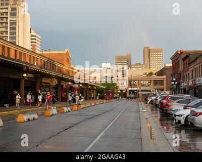 Ottawa, Ontario, Canada. July 2021. People stand out in the streets of Byward Market after a heavy rain. Byward is a very popular tourist district. Stock Photo