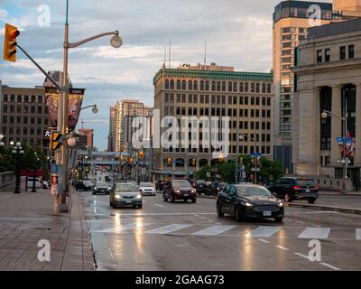 Ottawa, Ontario, Canada. July 2021. People stand out in the streets of Byward Market after a heavy rain. Byward is a very popular tourist district. Stock Photo