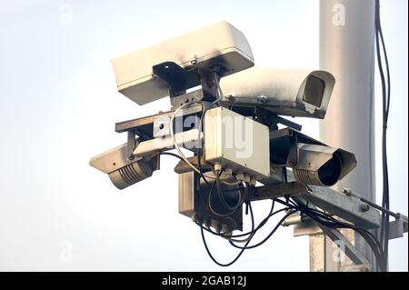 a video recording camera of violations is hanging on a pole Stock Photo