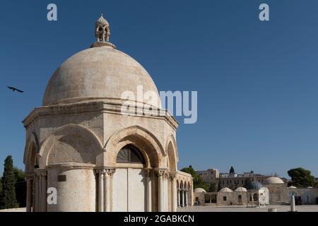 View of the Dome of the Ascension Qubbat al-Miraj or Mieradj built by Crusaders and renovated during the Ayyubid dynasty period (12th century) standing just north of the Dome of the Rock in the Temple Mount known to Muslims as the Haram esh-Sharif in the Old City East Jerusalem Israel Stock Photo