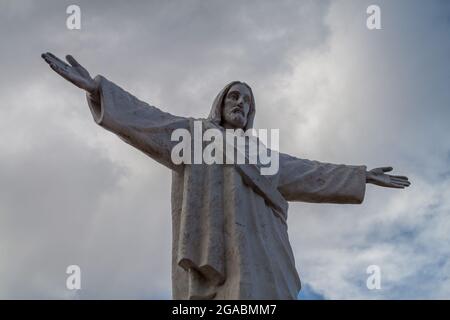 Statue of Jesus Christ on the mountain in Cuzco, Peru Stock Photo