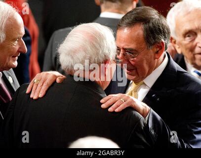 United States Secretary of Defense Leon Panetta shares a thought with U.S. Senator Carl Levin (Democrat of Michigan), Chairman of the U.S. Senate Armed Services Committee prior to President Barack Obama delivering his State of the Union Address to a Joint Session of Congress in the U.S. Capitol in Washington, D.C., Tuesday, January 24, 2012.  Looking on from left is U.S. Representative Sander Levin (Democrat of Michigan)..Credit: Ron Sachs / CNP/Sipa USA