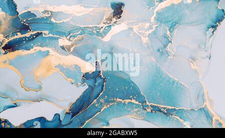 alcohol paint in blue with gold trim, creative decorative background for  artistic presentations Stock Photo - Alamy