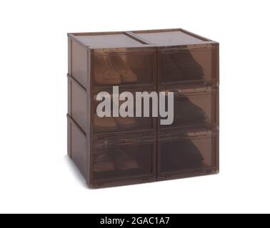 Brown shoe boxes with shoes isolated on white backgroud Stock Photo
