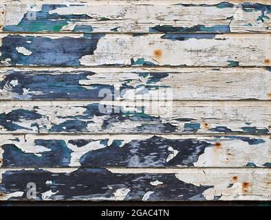 Horizontal slats of heavily weathered wood Stock Photo