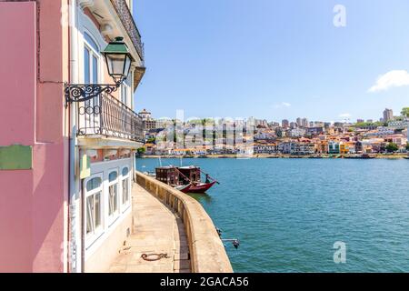 Vila Nova de Gaia seen from embankment of Douro River in Porto, Portugal Stock Photo