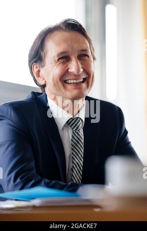 Flensburg, Germany. 28th July, 2021. Richard Damm, President of the Federal Motor Transport Authority (KBA), speaks during an interview. The law establishing the KBA was promulgated on 4 August 1951. Since 5 May 1952, the authority has had its official headquarters in Flensburg. Credit: Frank Molter/dpa/Alamy Live News Stock Photo