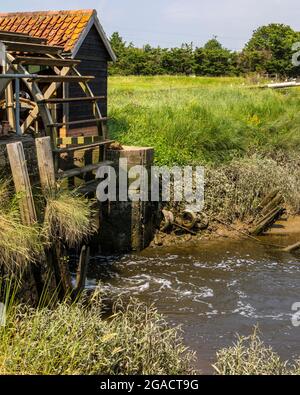 A view of the historic Tide Mill in the village of Battlesbridge in Essex, UK. Stock Photo