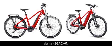 red modern mid drive motor city touring or trekking e bike pedelec with electric engine middle mount. battery powered ebike isolated on white backgrou Stock Photo
