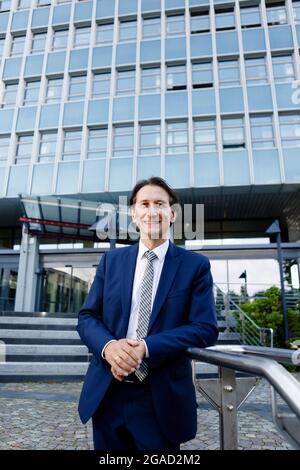 Flensburg, Germany. 28th July, 2021. Richard Damm, President of the Federal Motor Transport Authority (KBA), stands in front of the KBA entrance. The law establishing the KBA was promulgated on 4 August 1951. Since 5 May 1952 the authority has had its headquarters in Flensburg. Credit: Frank Molter/dpa/Alamy Live News Stock Photo