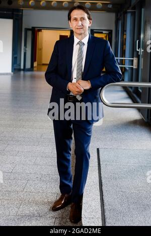 Flensburg, Germany. 28th July, 2021. Richard Damm, President of the Federal Motor Transport Authority (KBA), looks into the camera. The law establishing the KBA was promulgated on 4 August 1951. Since 5 May 1952, the authority has had its headquarters in Flensburg. Credit: Frank Molter/dpa/Alamy Live News Stock Photo