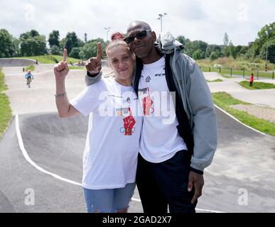 Nigel Whyte and Tracey Hill, parents of silver medallist Kye Whyte, at the Peckham BMX Club at The BMX Track London, in Burgess Park, south east London. Whyte, 21, grew up in south London, where his father Nigel Whyte was a co-founder of the Peckham BMX Club and coach to Kye which seeks to steer youngsters away from gang culture and crime. Picture date: Friday July 30, 2021. Stock Photo
