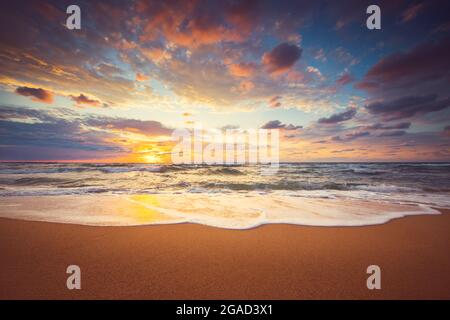 Dramatic cloudscape over the sea, sunrise shot Stock Photo