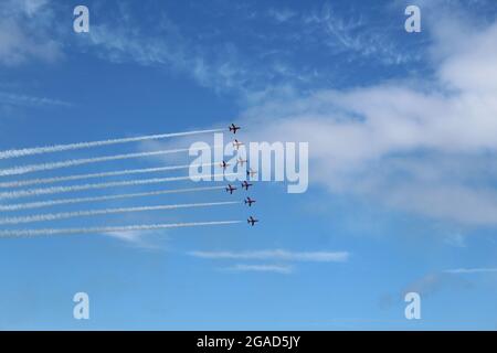 Acrobatic aricraft flying high speed maneuvers Stock Photo